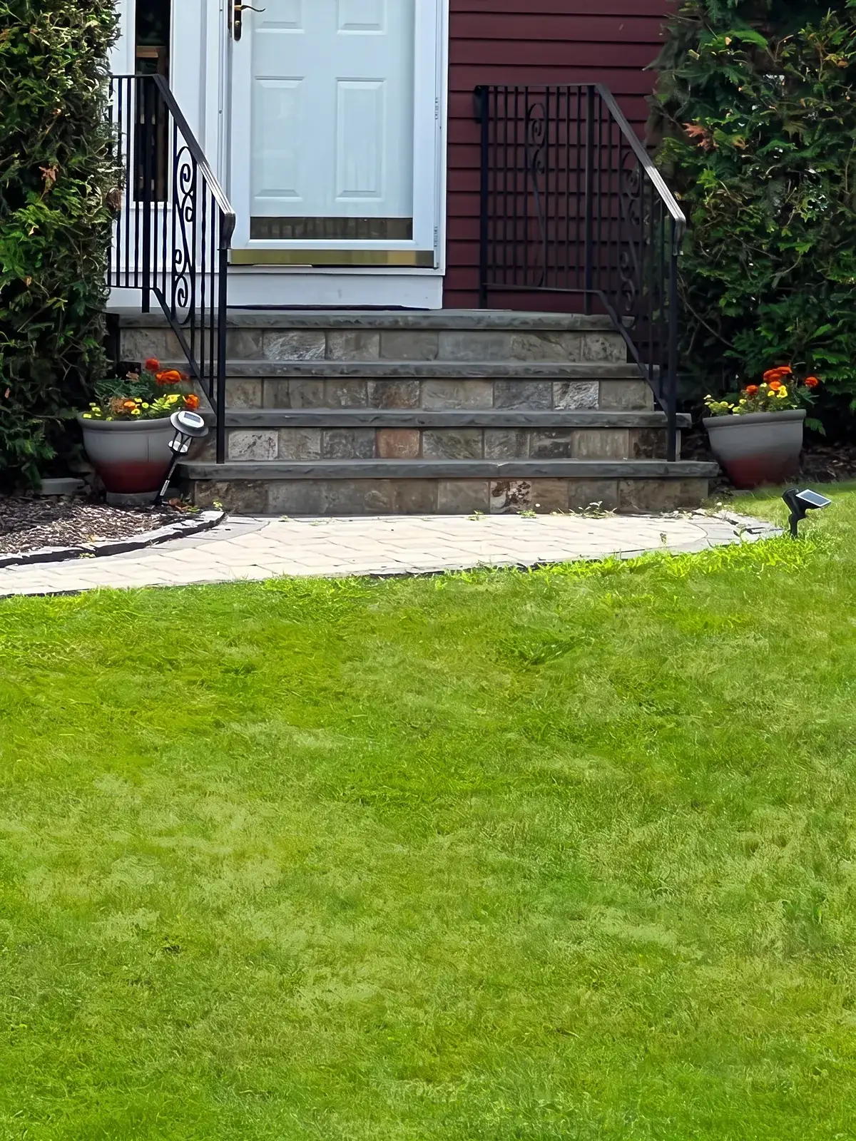 Stone front steps and paver walk